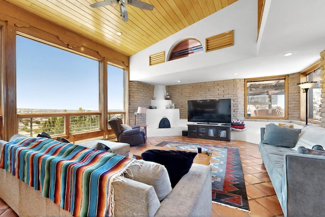 52 Tejon Canon Rd, Placitas, NM 87043 - living room with tile patterned floors, ceiling fan, recessed lighting, and wooden ceiling