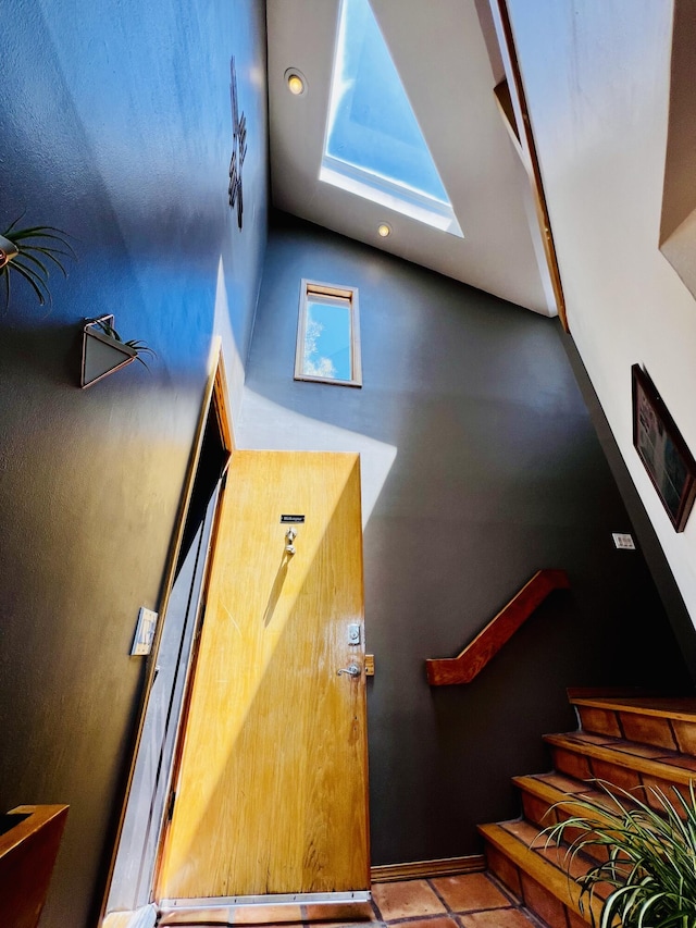 52 Tejon Canon Rd, Placitas, NM 87043 - stairs featuring high vaulted ceiling and recessed lighting