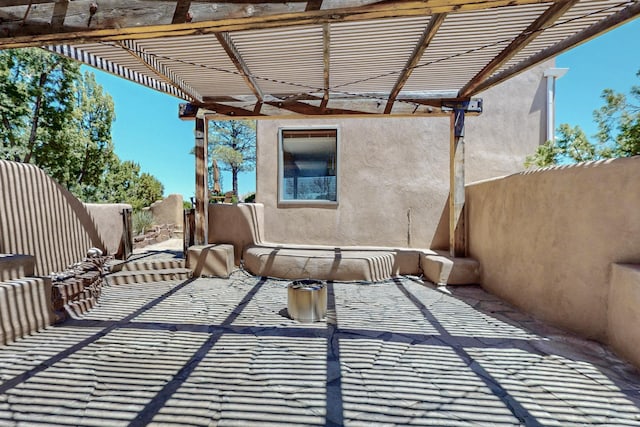 52 Tejon Canon Rd, Placitas, NM 87043 - view of patio featuring a pergola and fence