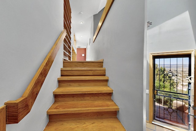 52 Tejon Canon Rd, Placitas, NM 87043 - staircase with a high ceiling
