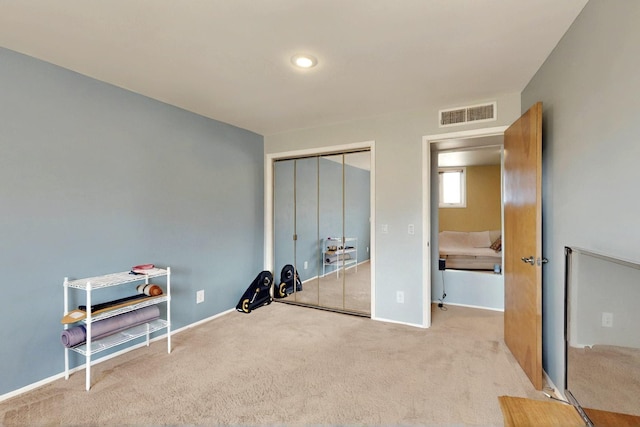 52 Tejon Canon Rd, Placitas, NM 87043 - unfurnished bedroom with carpet flooring, baseboards, and a closet