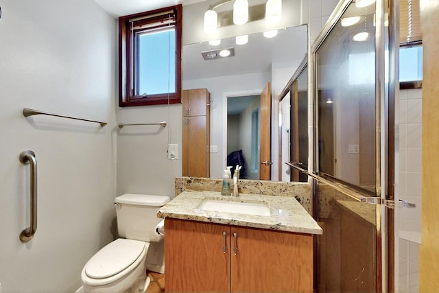 52 Tejon Canon Rd, Placitas, NM 87043 - full bath featuring toilet, vanity, and an enclosed shower