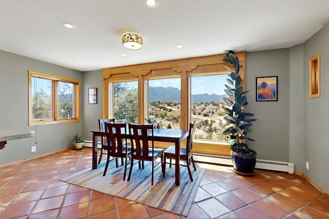52 Tejon Canon Rd, Placitas, NM 87043 - tiled dining room featuring baseboards, recessed lighting, and a mountain view