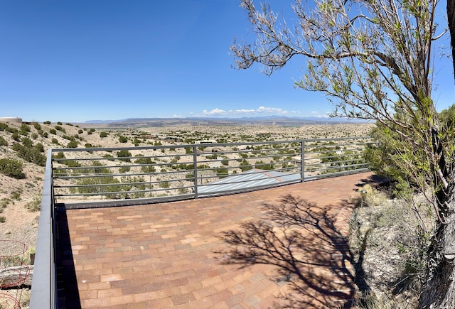 52 Tejon Canon Rd, Placitas, NM 87043 - view of patio featuring a mountain view