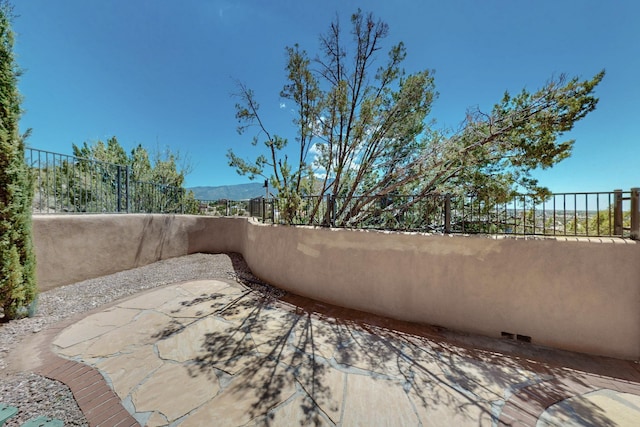52 Tejon Canon Rd, Placitas, NM 87043 - view of patio featuring fence
