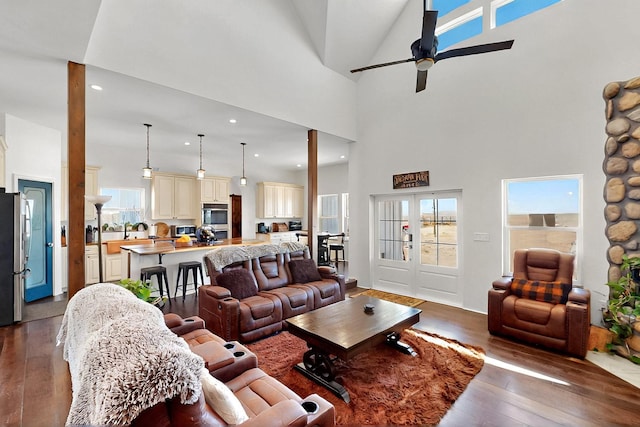 420 Bassett Blvd, Edgewood, NM 87015 - living room featuring dark wood-style flooring, ceiling fan, a high ceiling, and recessed lighting