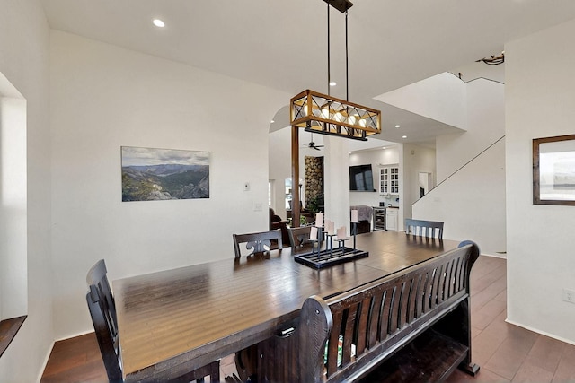 420 Bassett Blvd, Edgewood, NM 87015 - dining space featuring arched walkways and wood finished floors