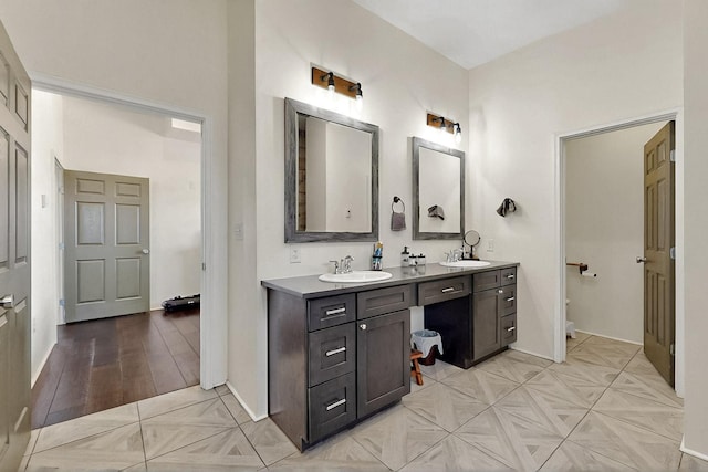 420 Bassett Blvd, Edgewood, NM 87015 - bathroom with double vanity and baseboards