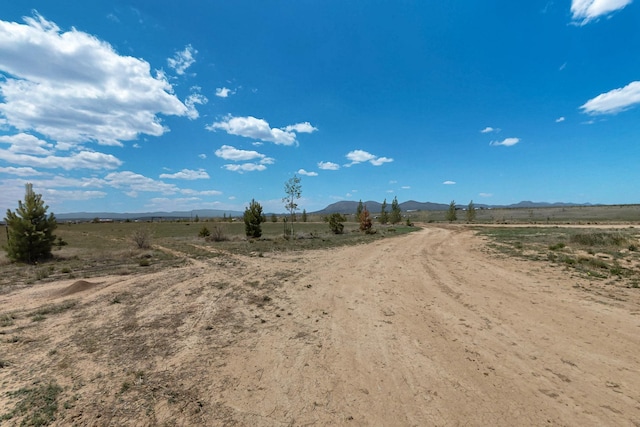 420 Bassett Blvd, Edgewood, NM 87015 - view of dirt / gravel road with a view of countryside and a mountain view