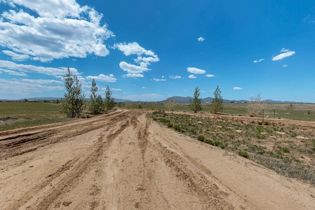 420 Bassett Blvd, Edgewood, NM 87015 - view of dirt / gravel road featuring a view of rural / pastoral area and a mountain view