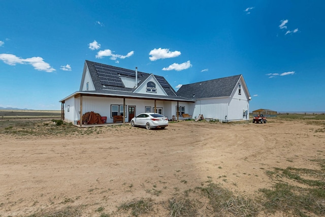 420 Bassett Blvd, Edgewood, NM 87015 - view of front of home featuring solar panels and roof with shingles