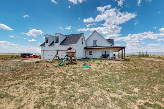 420 Bassett Blvd, Edgewood, NM 87015 - rear view of house with a playground