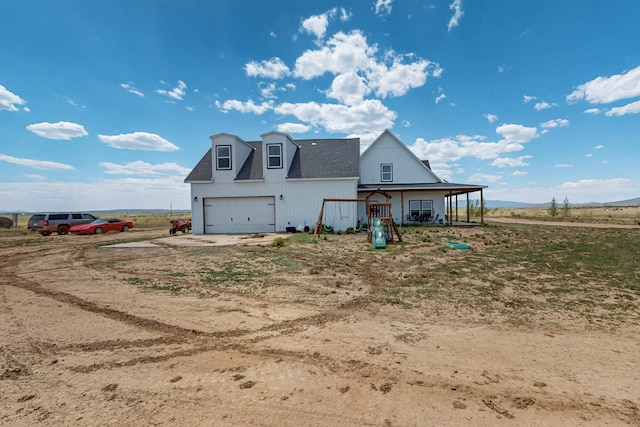 420 Bassett Blvd, Edgewood, NM 87015 - back of property featuring concrete driveway and a shingled roof