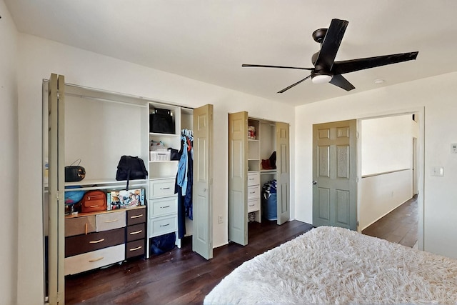420 Bassett Blvd, Edgewood, NM 87015 - bedroom with dark wood-style floors, multiple closets, and a ceiling fan