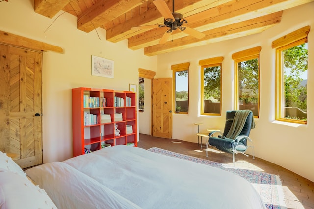 59 Perdiz Canyon Rd, Placitas, NM 87043 - bedroom with wooden ceiling with exposed beams