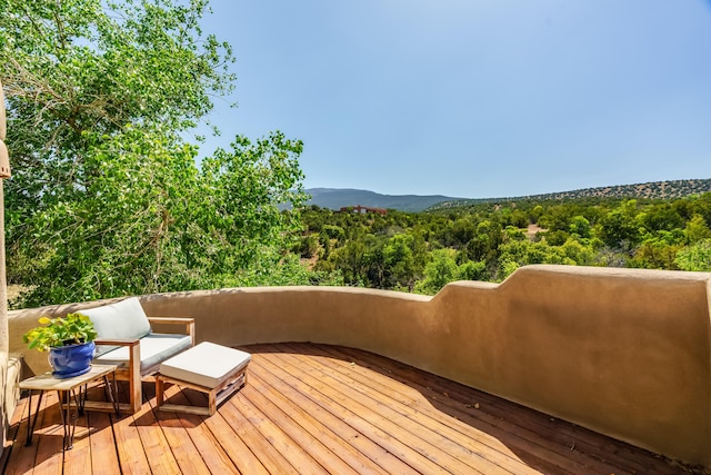 59 Perdiz Canyon Rd, Placitas, NM 87043 - wooden terrace with a view of trees