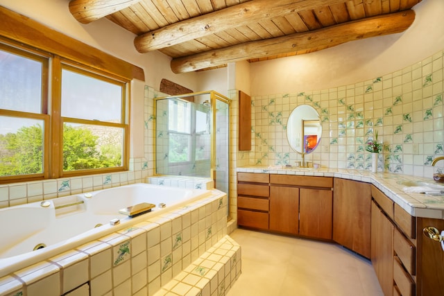 59 Perdiz Canyon Rd, Placitas, NM 87043 - bathroom featuring vanity, a stall shower, a tub with jets, wood ceiling with exposed beams, and tile patterned floors