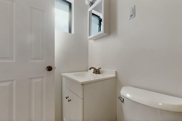 1614 Del Monte Trl SW, Albuquerque, NM 87121 - half bath featuring vanity and toilet