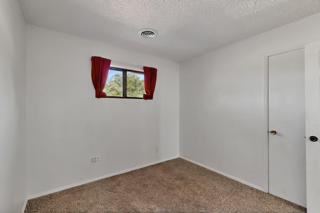 1614 Del Monte Trl SW, Albuquerque, NM 87121 - empty room featuring carpet, a textured ceiling, and baseboards