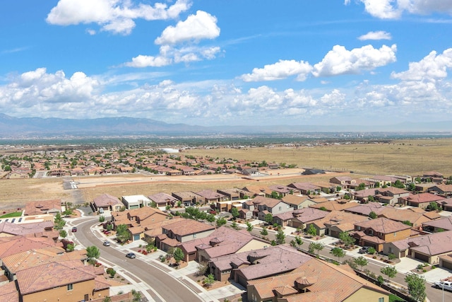6808 Vista Luces St NW, Albuquerque, NM 87120 - aerial perspective of suburban area featuring mountains