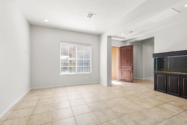 729 Sierra Verde Way NE, Rio Rancho, NM 87124 - unfurnished living room featuring light tile patterned floors, recessed lighting, baseboards, and a textured ceiling