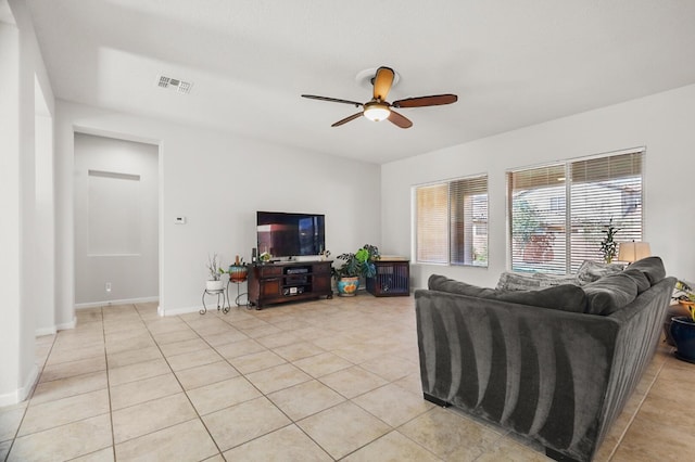 729 Sierra Verde Way NE, Rio Rancho, NM 87124 - living area featuring a ceiling fan, light tile patterned floors, and baseboards