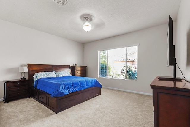 729 Sierra Verde Way NE, Rio Rancho, NM 87124 - bedroom featuring light colored carpet, baseboards, and a textured ceiling