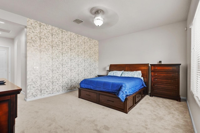 729 Sierra Verde Way NE, Rio Rancho, NM 87124 - bedroom featuring light colored carpet, baseboards, ceiling fan, and wallpapered walls