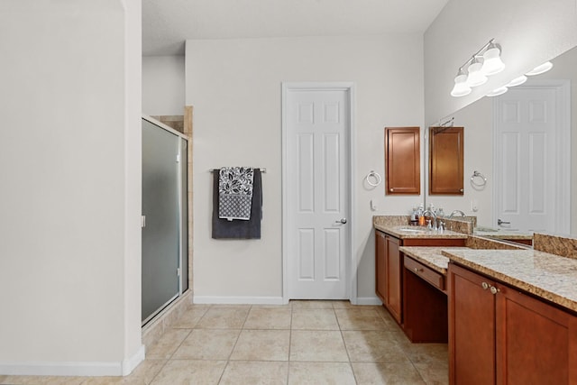 729 Sierra Verde Way NE, Rio Rancho, NM 87124 - full bath with a stall shower, tile patterned flooring, vanity, and baseboards