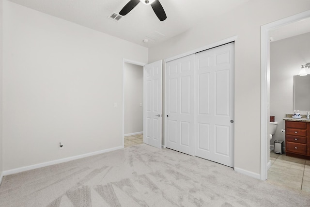 729 Sierra Verde Way NE, Rio Rancho, NM 87124 - unfurnished bedroom featuring light carpet, a closet, and baseboards