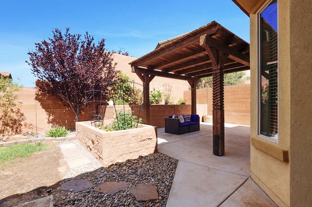 729 Sierra Verde Way NE, Rio Rancho, NM 87124 - view of patio / terrace with an outdoor hangout area and a fenced backyard