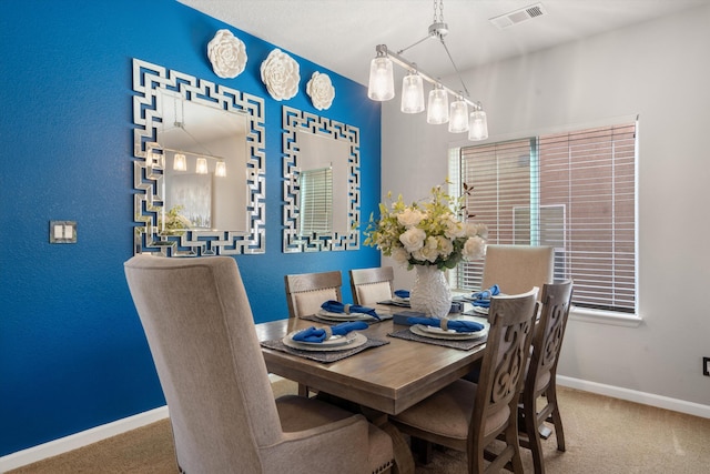 3604 Plano Vista Rd NE, Rio Rancho, NM 87124 - dining area with carpet flooring and baseboards