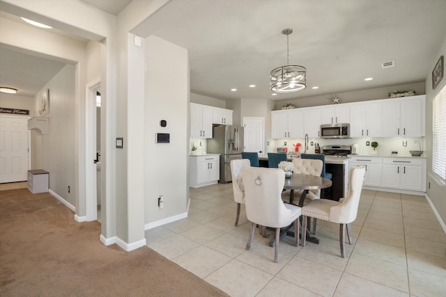 3604 Plano Vista Rd NE, Rio Rancho, NM 87124 - dining room with a chandelier, baseboards, recessed lighting, and light tile patterned flooring