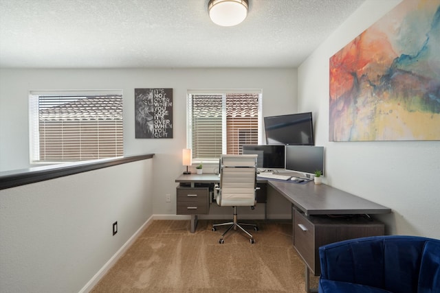 3604 Plano Vista Rd NE, Rio Rancho, NM 87124 - carpeted home office with plenty of natural light, baseboards, and a textured ceiling