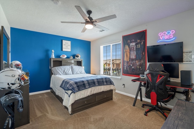 3604 Plano Vista Rd NE, Rio Rancho, NM 87124 - carpeted bedroom featuring an office area, baseboards, a ceiling fan, and a textured ceiling