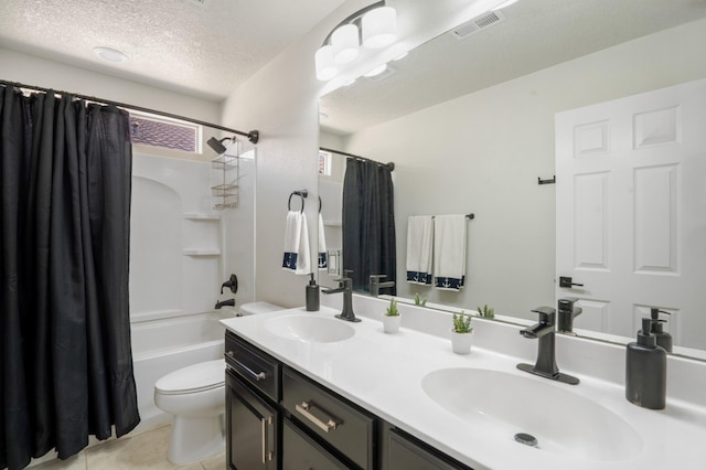 3604 Plano Vista Rd NE, Rio Rancho, NM 87124 - full bath with toilet, double vanity, shower / bath combo, a textured ceiling, and tile patterned flooring