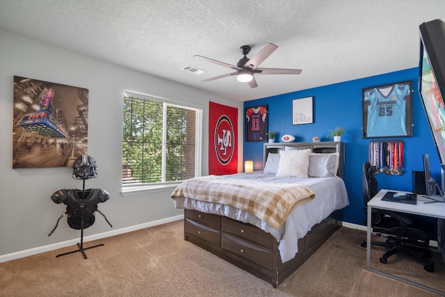 3604 Plano Vista Rd NE, Rio Rancho, NM 87124 - carpeted bedroom with baseboards, a textured ceiling, and a ceiling fan