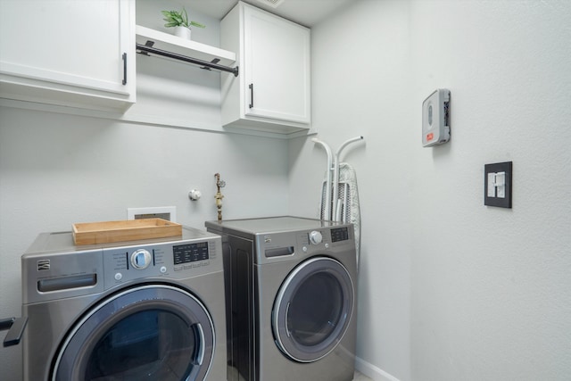 3604 Plano Vista Rd NE, Rio Rancho, NM 87124 - laundry room with cabinet space, washer and clothes dryer, and baseboards