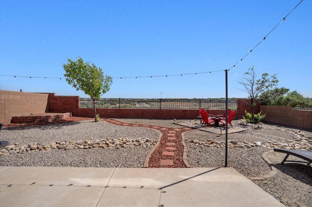 3604 Plano Vista Rd NE, Rio Rancho, NM 87124 - fenced backyard with a patio area