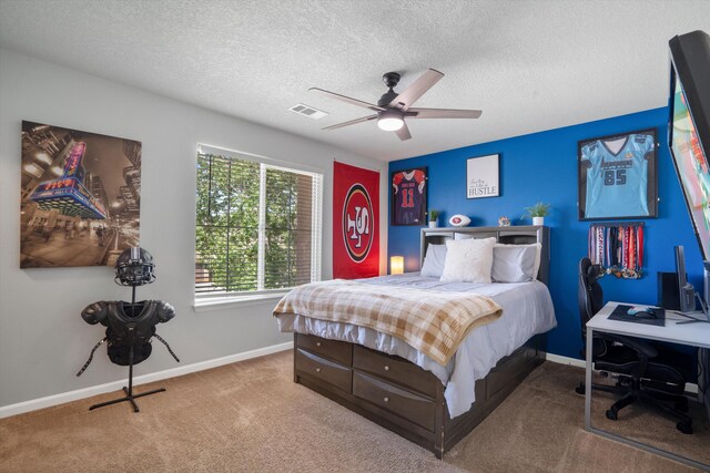 3604 Plano Vista Rd NE, Rio Rancho, NM 87124 - bedroom featuring carpet, a textured ceiling, and ceiling fan