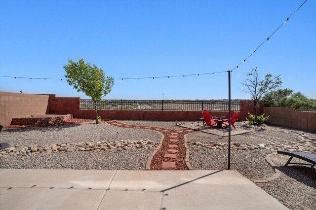 3604 Plano Vista Rd NE, Rio Rancho, NM 87124 - fenced backyard featuring a patio area