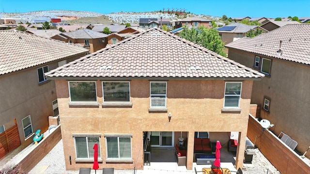 3604 Plano Vista Rd NE, Rio Rancho, NM 87124 - rear view of property with a patio area, a fenced backyard, stucco siding, and a residential view