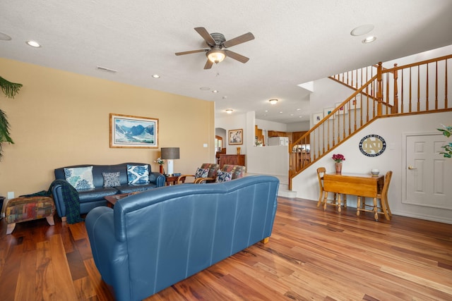 3916 Alamogordo Dr NW, Albuquerque, NM 87120 - living room with a ceiling fan, stairway, wood finished floors, a textured ceiling, and recessed lighting