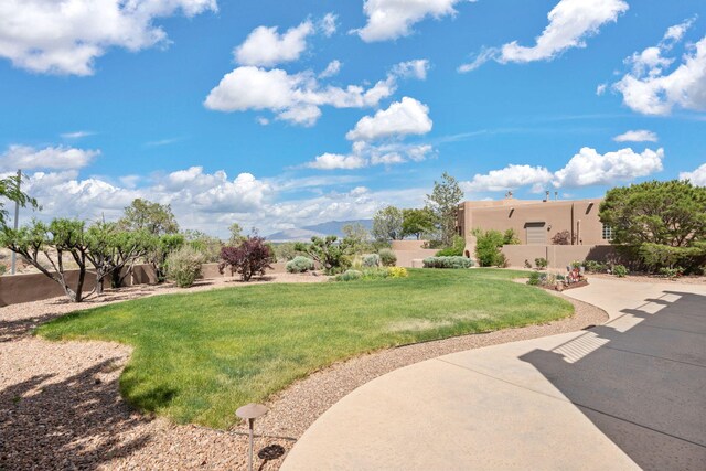 3916 Alamogordo Dr NW, Albuquerque, NM 87120 - view of grassy yard featuring a mountain view