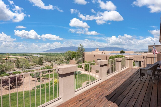 3916 Alamogordo Dr NW, Albuquerque, NM 87120 - wooden deck with a mountain view