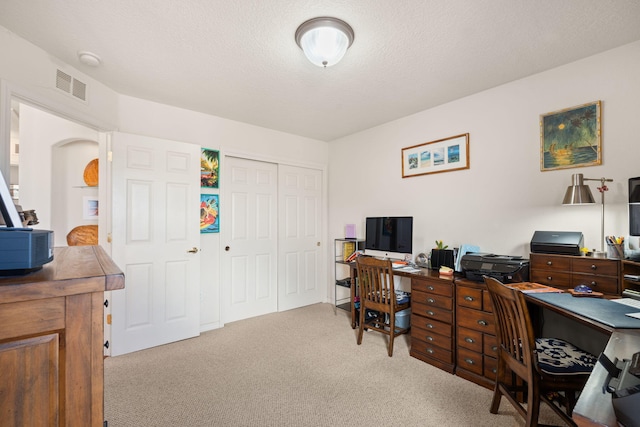 3916 Alamogordo Dr NW, Albuquerque, NM 87120 - carpeted home office featuring arched walkways
