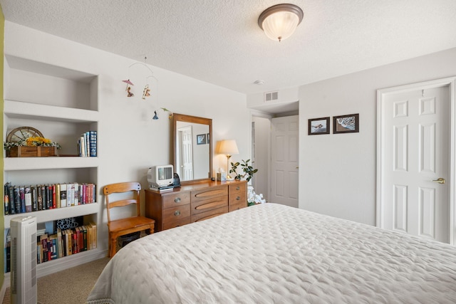 3916 Alamogordo Dr NW, Albuquerque, NM 87120 - bedroom with a textured ceiling and carpet