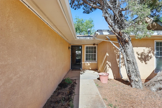 1595 W Bosque Loop, Bosque Farms, NM 87068 - property entrance featuring stucco siding