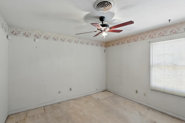 1595 W Bosque Loop, Bosque Farms, NM 87068 - empty room with ceiling fan, concrete floors, and a pendent fire sprinkler