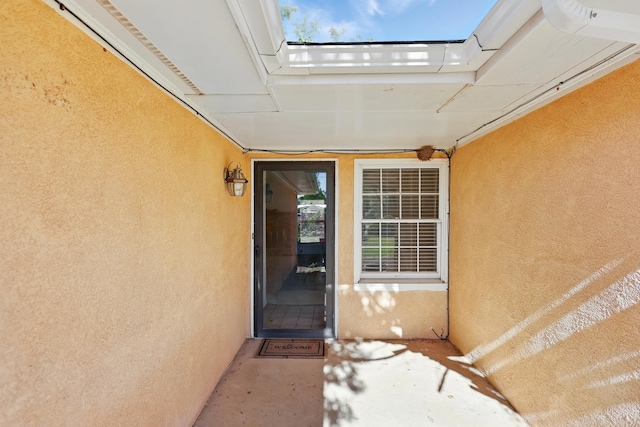 1595 W Bosque Loop, Bosque Farms, NM 87068 - view of exterior entry featuring stucco siding